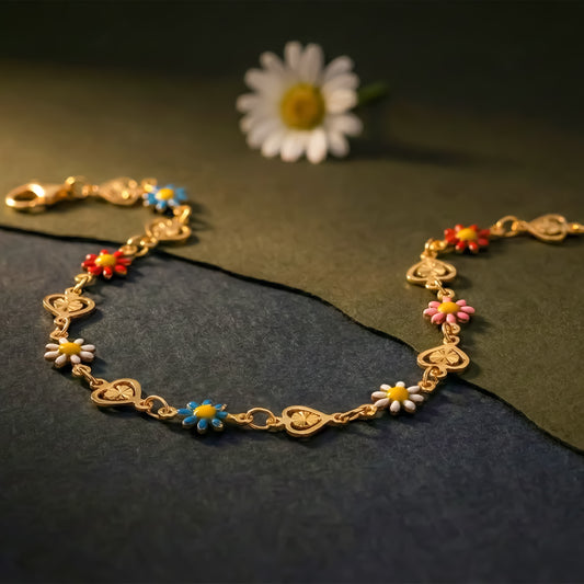 Gold-tone floral charm bracelet with small pink, blue, and red flower beads