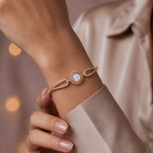 Rose gold CZ halo bangle bracelet on wrist, circular halo center with pave accents