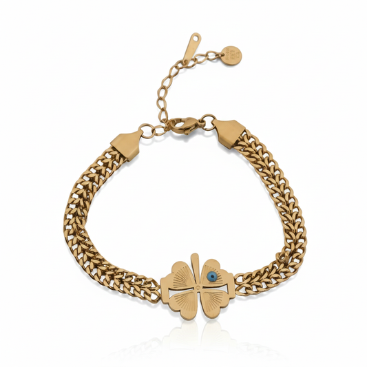 Gold braided chain bracelet with clover flower charm and toggle clasp