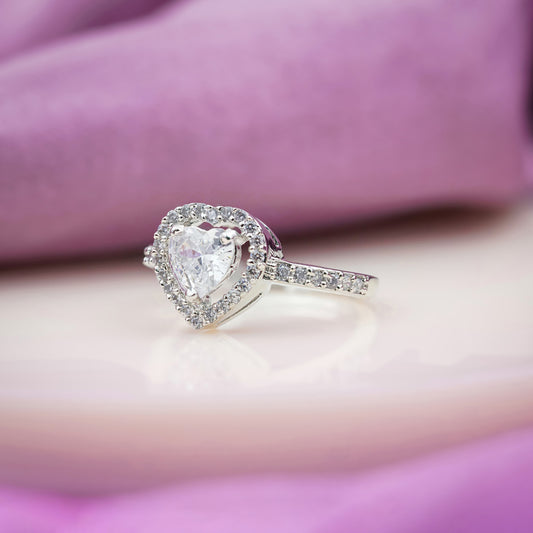 Silver heart halo ring with crystal center and pavé band