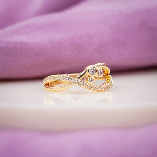 Rose gold infinity crossover ring with pavé crystals and cluster stones