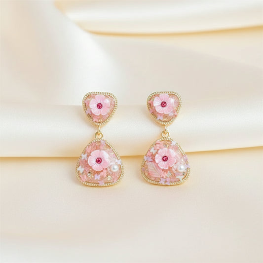 Pink heart drop earrings with gold frames, small pink flowers, faux pearl detailing