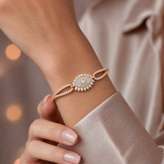 Rose gold evil eye CZ baguette bracelet with lash detail