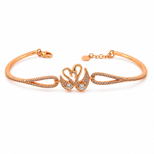 Rose gold CZ twin swan bangle bracelet with pavé stones