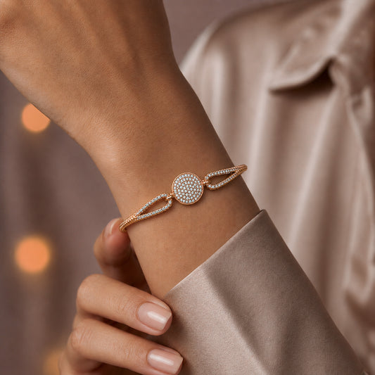Rose gold CZ pavé disc medallion bangle bracelet on wrist