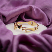 Noir Butterfly Gold Triple Bar Kada Bangle