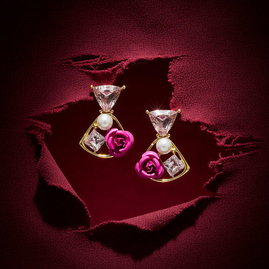 Crystal drop earrings with pink rose detail, gold-tone frame, pearls, and clear faceted stones