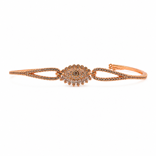 Rose gold CZ evil eye bangle bracelet with baguette and lash details