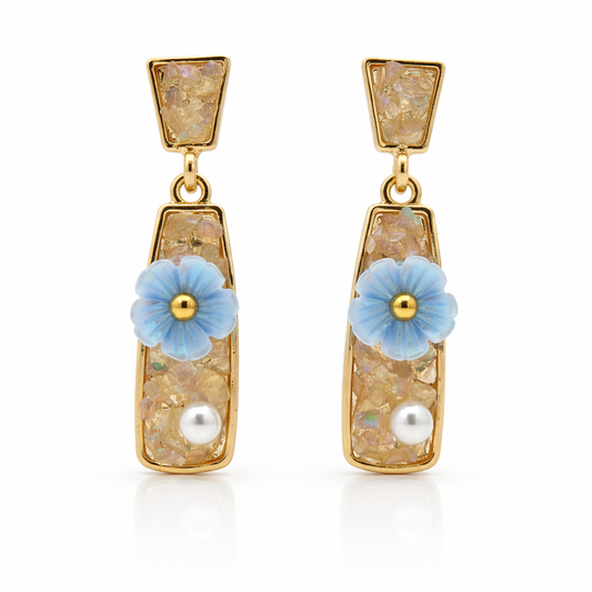 Gold-tone resin drop earrings with blue flower stud and pearl dangle in geometric squares