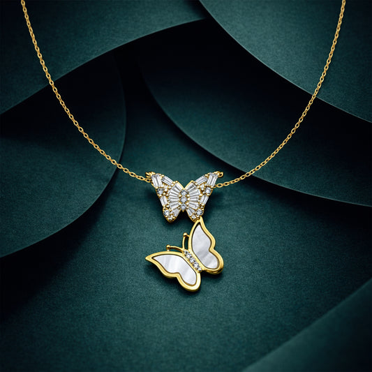 Gold butterfly pendant necklace with crystal stones and mother-of-pearl enamel on chain