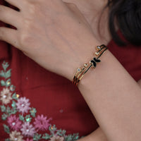 Noir Butterfly Gold Triple Bar Kada Bangle