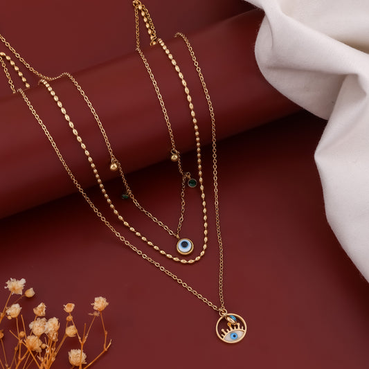 Gold triple-layer evil-eye charm necklace with multiple eye beads and round pendant