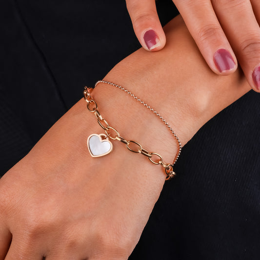 Gold-tone stainless steel bracelet with heart charms and bead-link chain