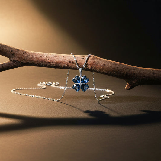 Silver-tone chain necklace with blue flower pendant charm